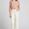 Blusa botones forrados y manga transparente