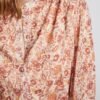 Blusa botones forrados y manga transparente