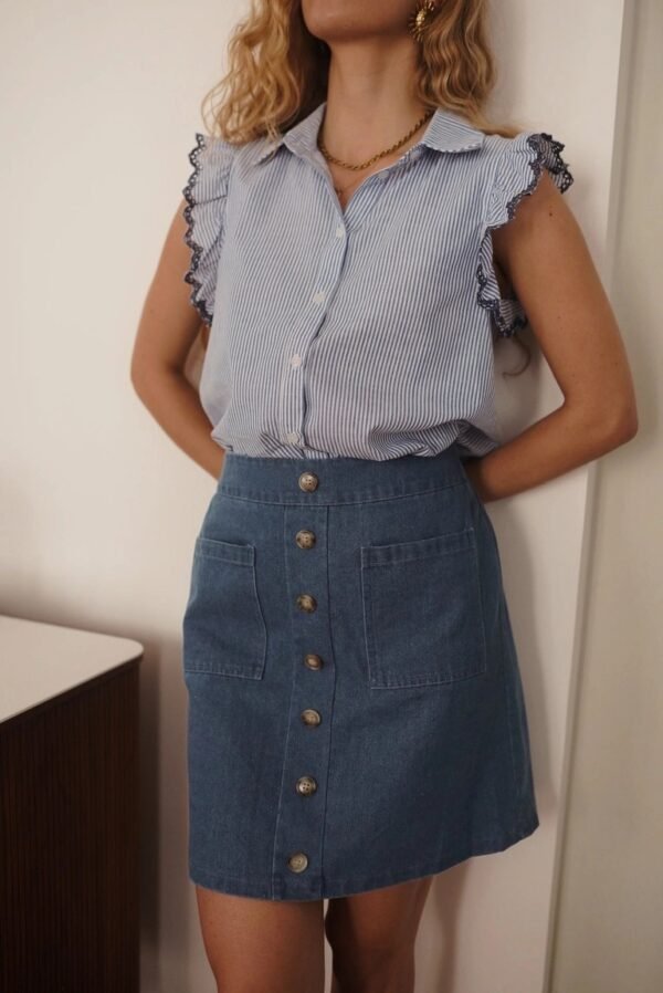 Blusa sin mangas rayas y volantes azul